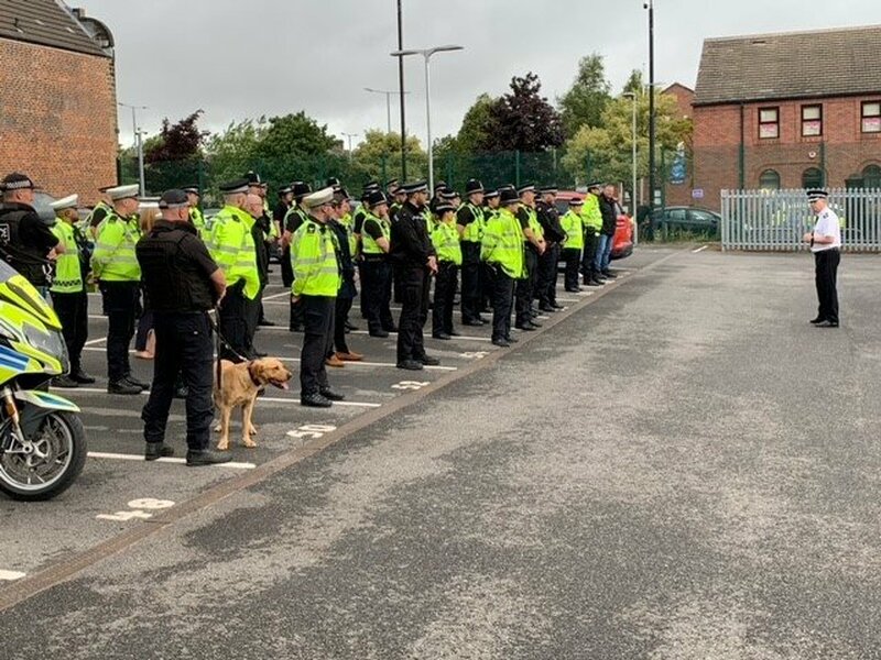 Main image for Police officers flood town’s streets