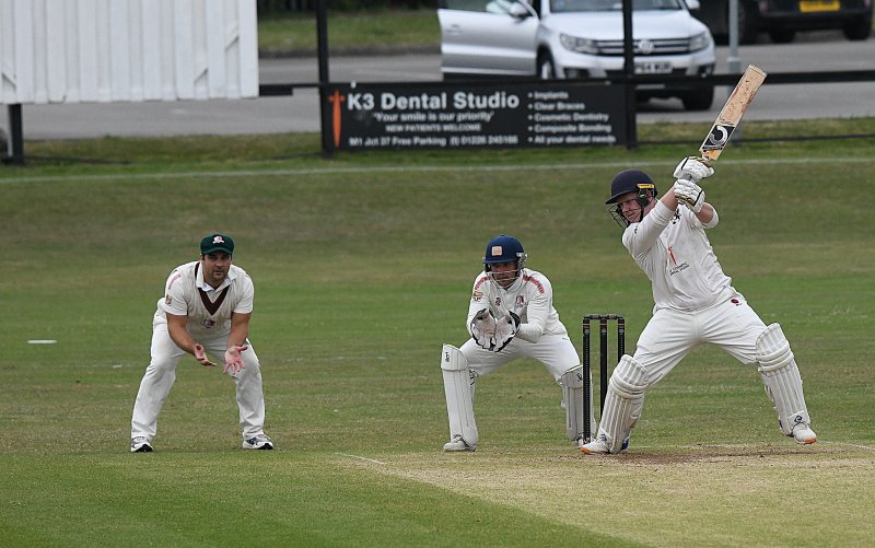 Main image for Beck bashes century to keep Barnsley in contention for title
