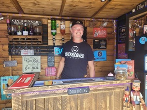 Mark Harrison in his garden/bar
