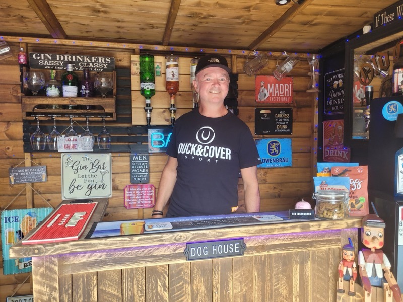 Mark Harrison in his garden/bar