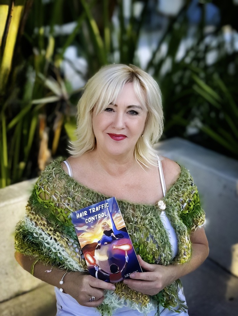 Main image for Hairdresser Lizzi pens book after move to Oz