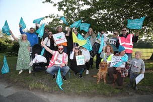 Staff protest during a previous day of action.