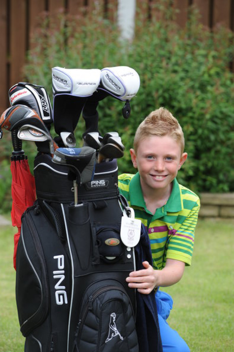 Main image for Ben, nine, is a hit at golf