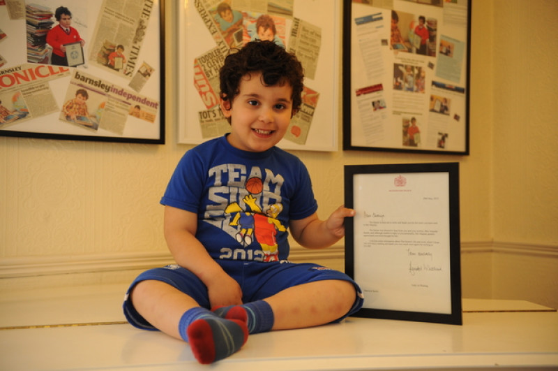 Main image for Boy genius receives royal recognition