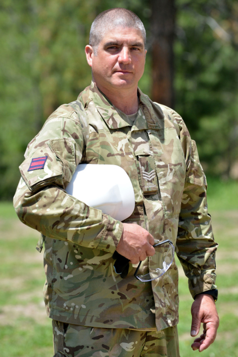 Main image for Soldier on exercise in Black Hills of Dakota meets US governor