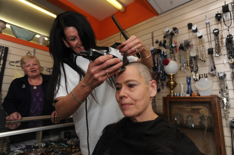 Main image for Mum shaves head to cheer up son