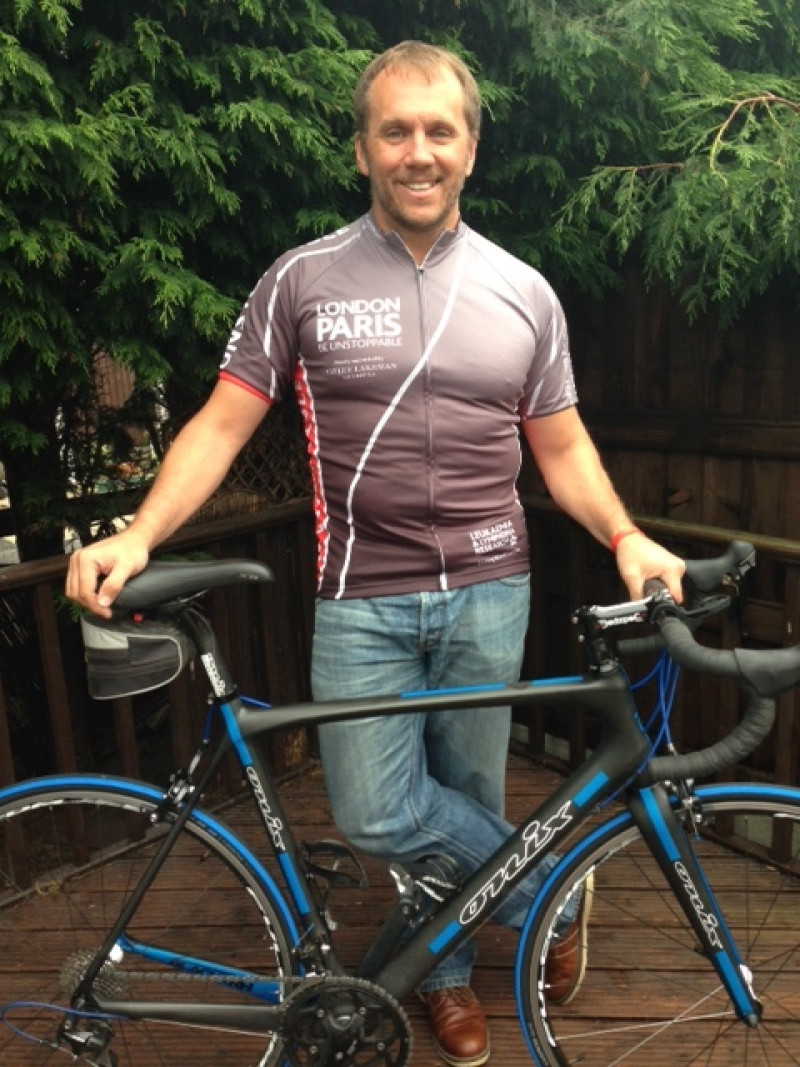 Main image for TV star joins footballers on bike ride