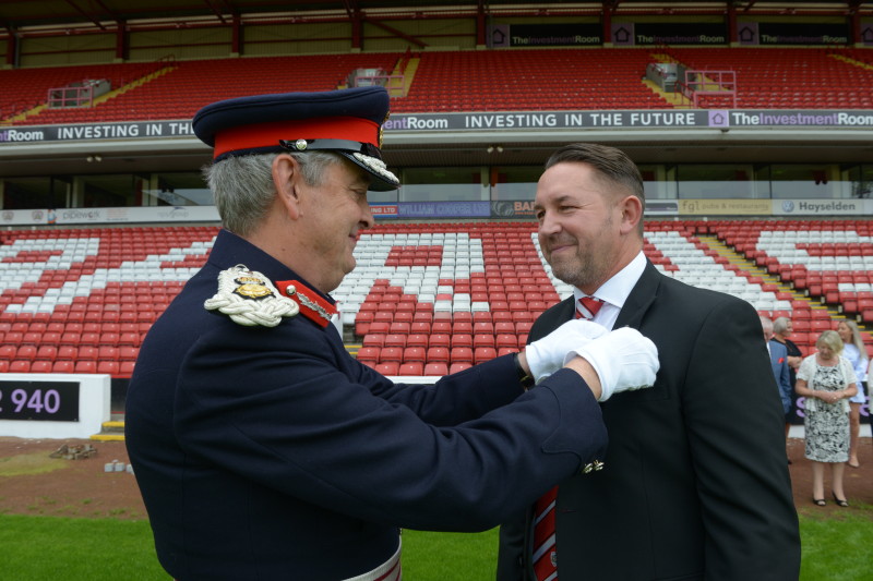 Main image for Rimmo family presented with British Empire Medal 