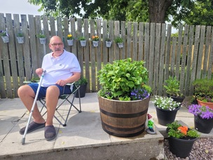 Michael Carr in his garden in Penistone.