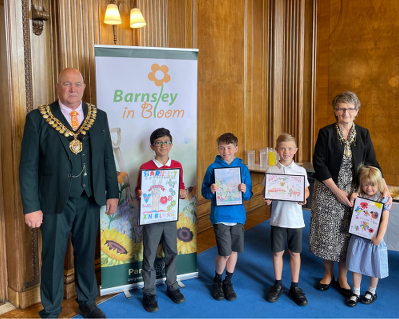 IN BLOOM: The competition winners at the town hall.