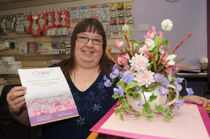 Main image for Tea pot tops competition with gold award