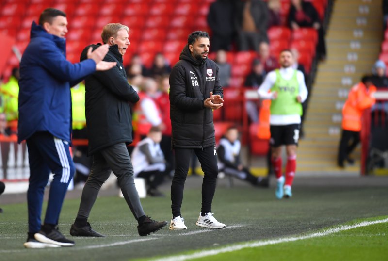 Poya Asbaghi, right, and Paul Heckingbottom
