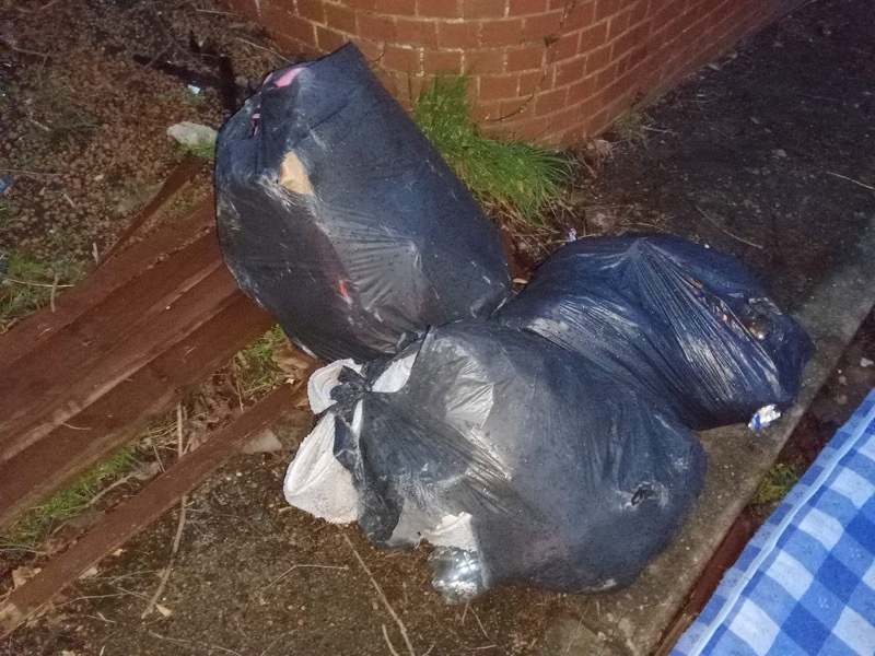 DISGRACEFUL: Some of the fly-tipped rubbish at the site.