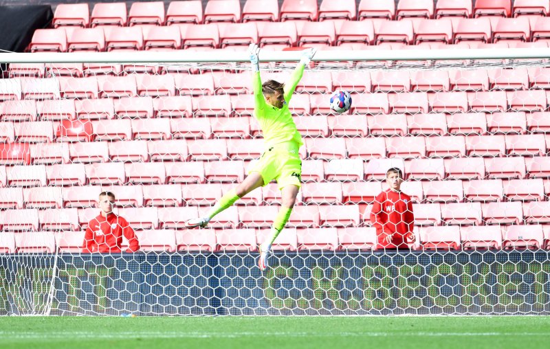 Brad Collins is beaten at Oakwell in Wycombe's 3-0 August win