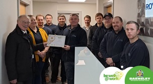 AWARD: Royston Glass employees toast their award.