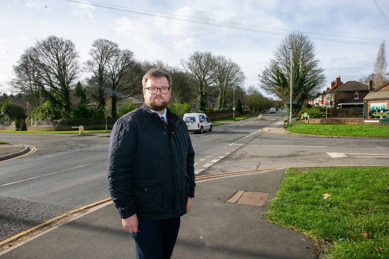 NEW SIGNS: Coun James Higginbottom, at the cross roads in Wombwell, were new road signs are to be installed. Picture Shaun Colborn PD092982