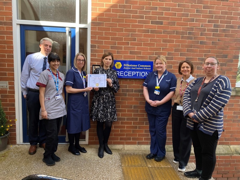 AWARD: Representatives from the school, Barnsley Council and Barnsley Hospital at Silkstone Common Junior and Infant School.