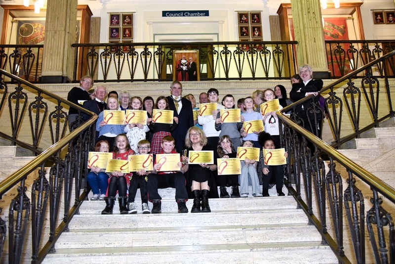 STARS: Award winners from Darton are pictured at the town hall.
