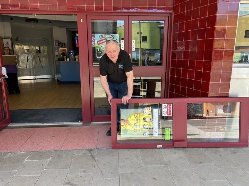 BREAK-IN: Owner Rob Younger assessing the damage.