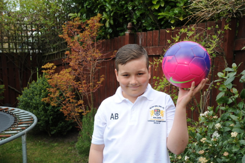Main image for Alex keeps kicking through cancer treatment