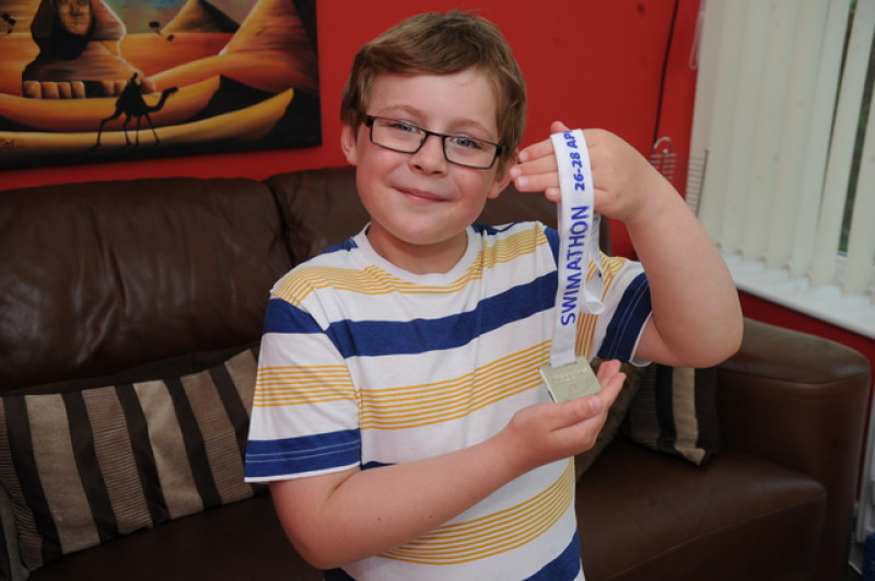 Main image for Swimmer makes splash with fundraising
