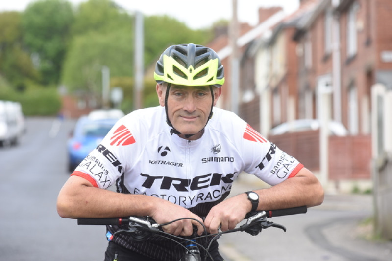 Main image for Ian celebrates conquering weighty challenge