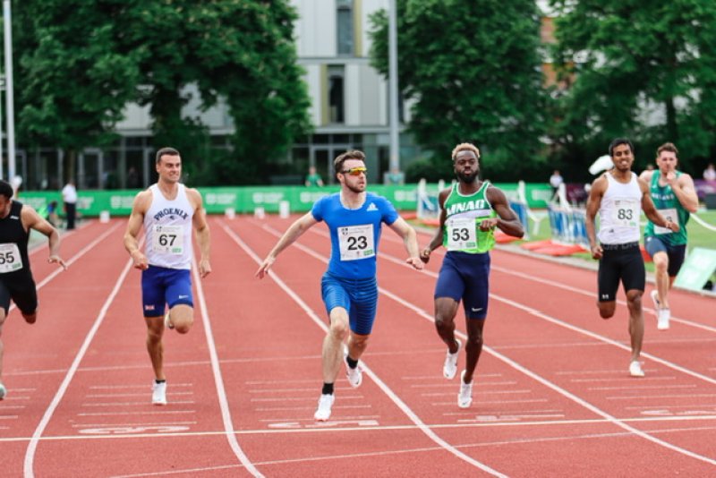 Winner: Joe Ferguson, in blue, as he smashed his 100m personal best.