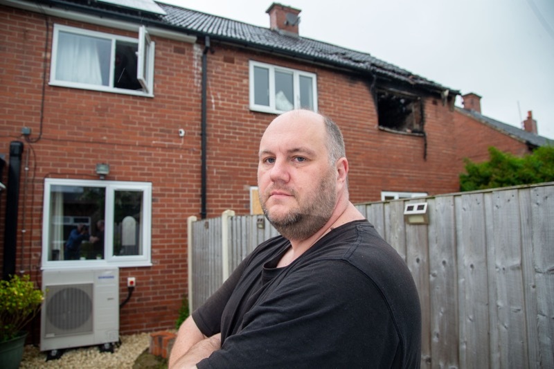 FIRE: Richard Woodruff whose own house nearly succumbed to the same fate as his neighbours house fire caused by possible electical overload in the attic. Picture Shaun Colborn PD093156