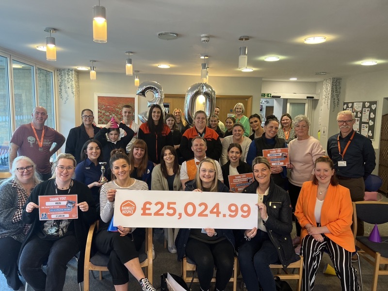 Contributors of the accumulator challenge celebrating the grand total.