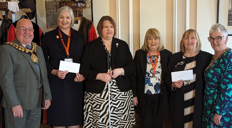 CHARITY MISSION: Mayor of Barnsley Mick Stowe handed over two cheques earlier this week.