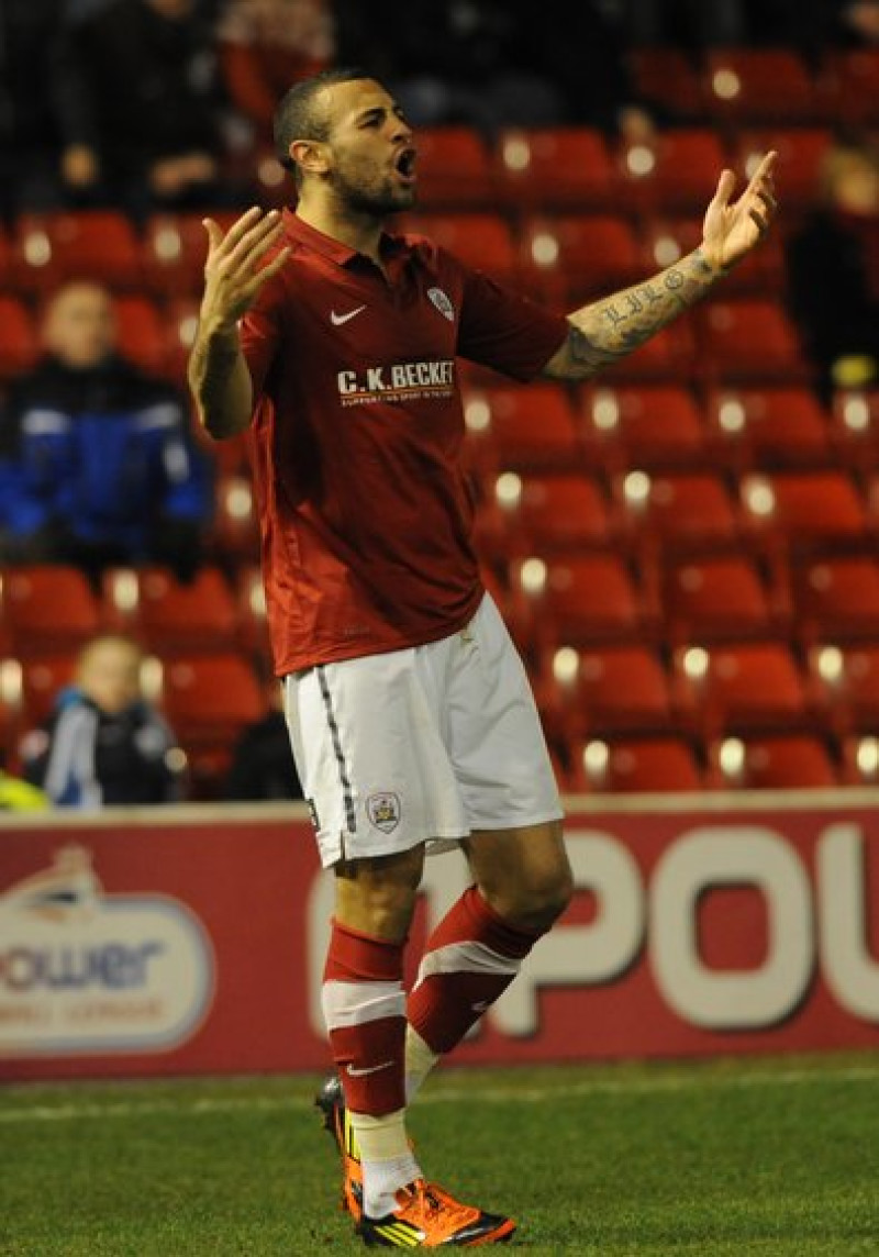 Main image for Davies screamer earns Reds point at the Reebok