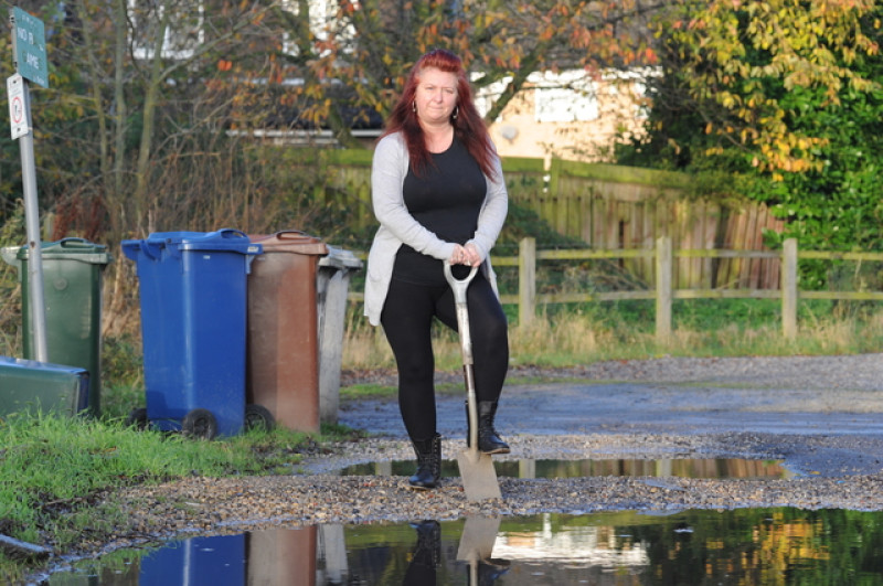 Main image for Resident takes up pothole fight