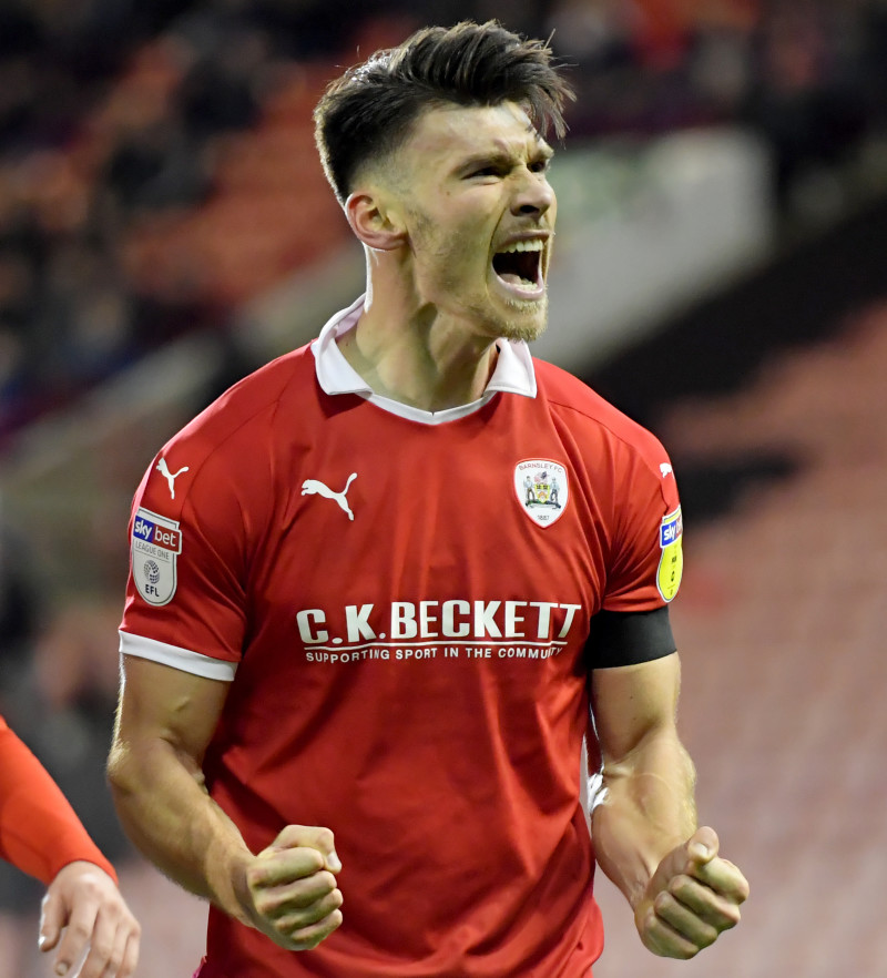 Main image for Moore secures late win for Reds 