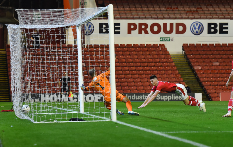 Main image for Reds thrash Mapgies to reach second round 