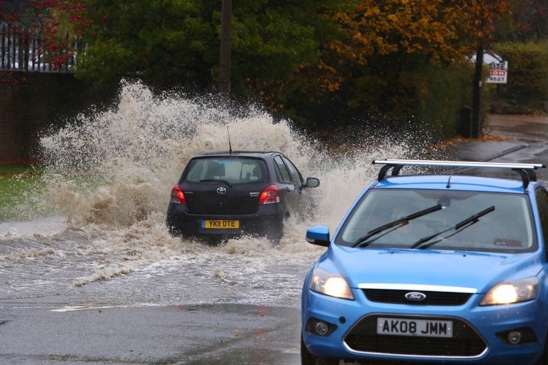 Main image for Residents flee flooded homes