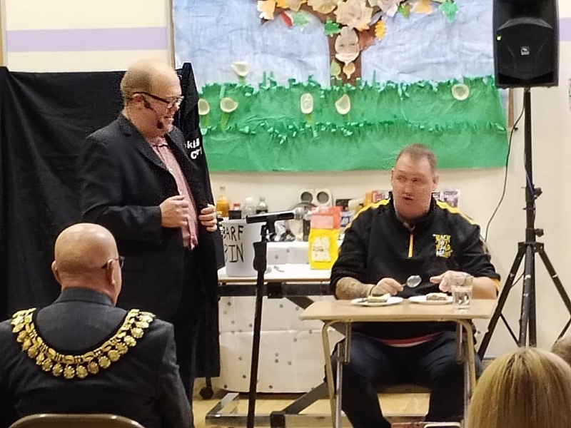Karl Hemmingway hosting to the left of Mayor Mick Stowe and YouTuber Danny Malin.