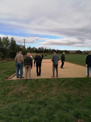 Members of Ingbirchworth Petanque Club playing the sport.