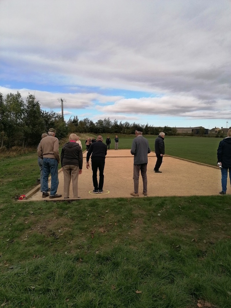 Members of Ingbirchworth Petanque Club playing the sport.