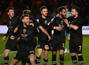 Barnsley celebrate scoring at Lincoln City. Picture: AH Pix.