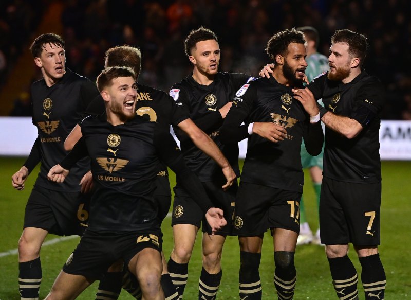Barnsley celebrate scoring at Lincoln City. Picture: AH Pix.