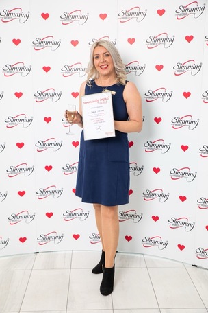 Sonja I’Anson,, receiving a Community Impact Award.