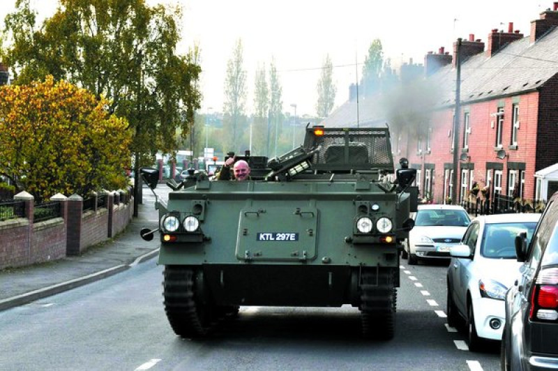 Main image for Military occupies kids at school