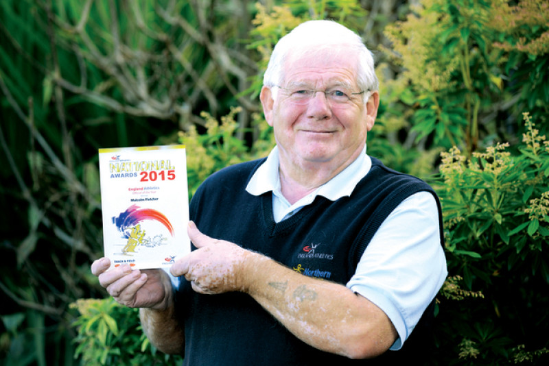 Main image for Top award for athletics official Malcolm