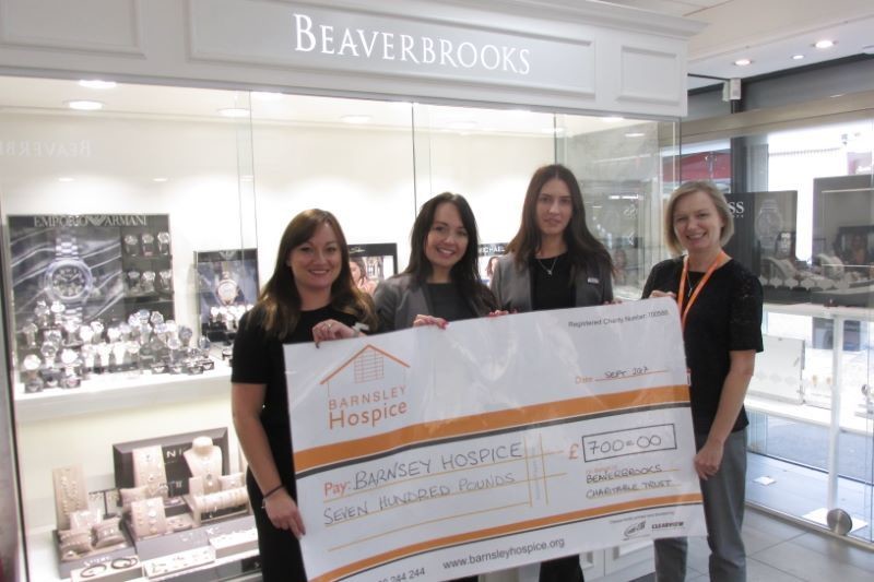 Main image for Jewellers staff donate £700 to hospice