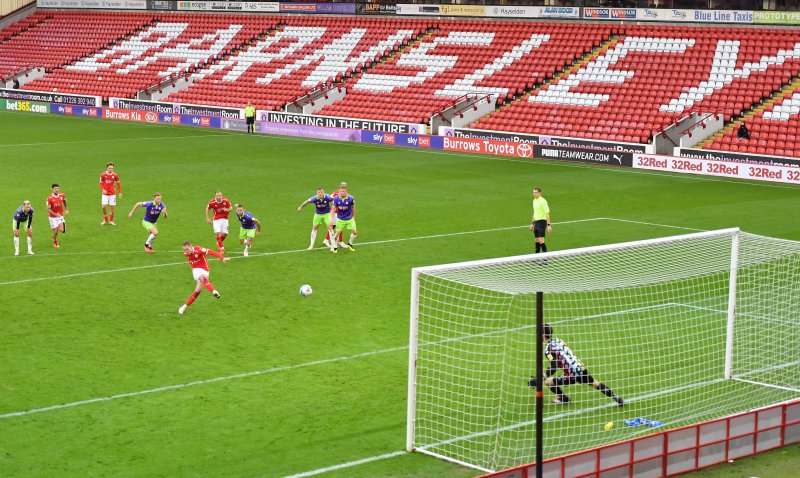 Main image for Woodrow's 102nd-minute penalty rescues point for Reds