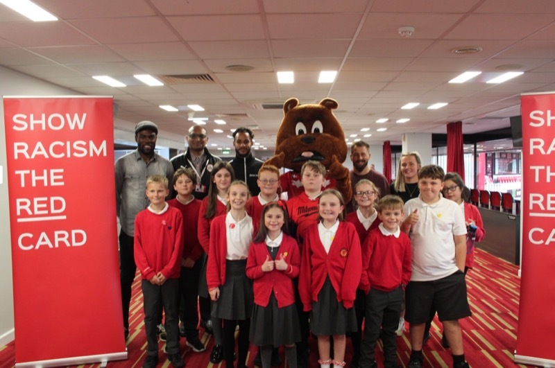 SHOW RACISM THE RED CARD: Some of the pupils at the event last week.