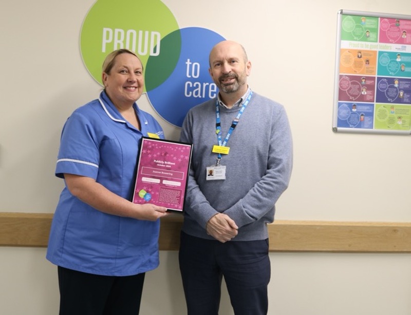 Jo Bowering receives a Brilliant award from Barnsley Hospital NHS Foundation Trust chief executive Dr Richard Jenkins.