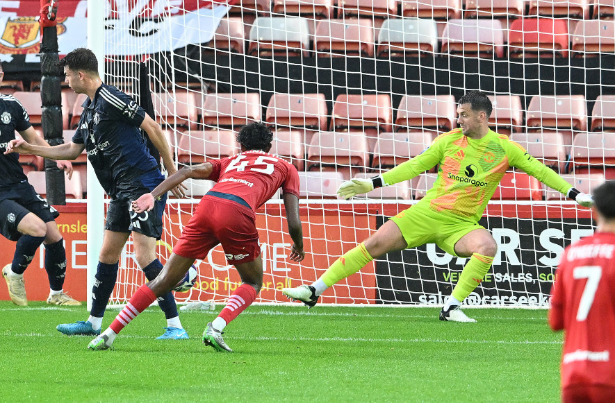 Vimal Yoganathan scores against Manchester United under 21s last season