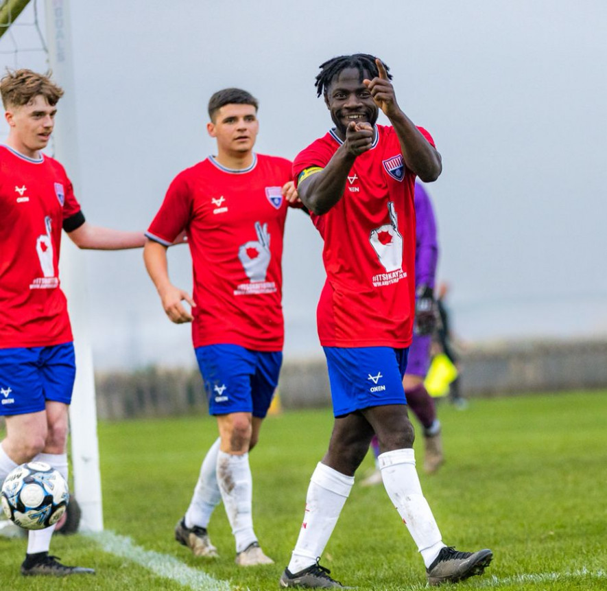 On form: Elite AFC celebrate a goal. Picture: Steve Biltcliffe.