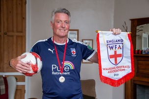CHAMPIONS: Elsecar man Alan Davies who has just returned with his championship medal. Picture Shaun Colborn PD094591